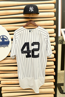 An authentic Yankees jersey and hat, signed by Mariano Rivera, are among the many items available for purchase on eBay.