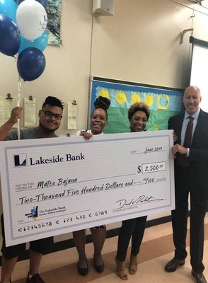 Winner Mateo Bajana is on the left. Alan Rose of Lakeside Bank on the right. Alexandria Cummings and Michele Howard of the Chicago Public Schools are between them.