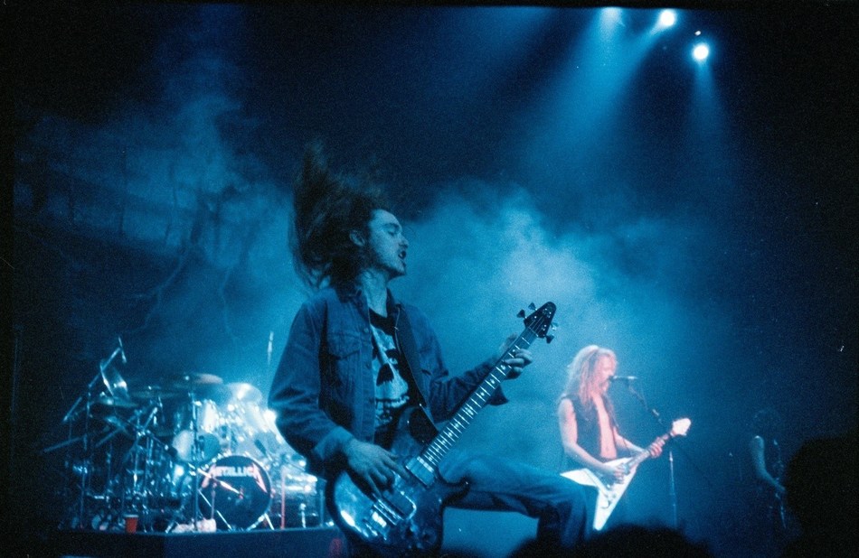 Cliff Burton, live photo. Photo Credit: Harald Oimoen, from the book "Murder in the Front Row: Shots from the Bay Area Thrash Metal Epicenter."