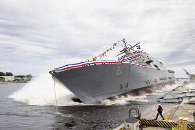 The 21st Littoral Combat Ship, the future USS Minneapolis-Saint Paul, launches sideways into the Menominee River in Marinette, Wisconsin, on June 15. The 21st Littoral Combat Ship, the future USS Minneapolis-Saint Paul, launches sideways into the Menominee River in Marinette, Wisconsin, on June 15.