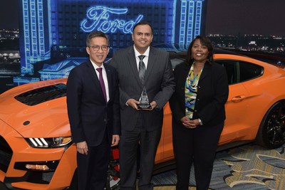 IWT CEO Netresh Rege was presented with a Wheel and Tire World Excellence Award by Hau Thai-Tang, Ford chief product development and purchasing officer, and Linda Cash, Ford vice president, quality and new model programs.