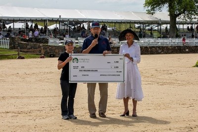 From left to right:  Elaine Rogers, President and CEO of USO-Metro; C.D. Moore, COO of Caliburn; Barbara Roux, President of the Upperville Colt and Horse Show.