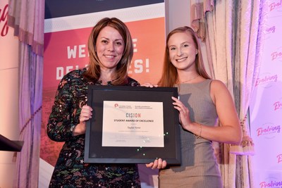 Taylor Fenn (right) receiving the 2019 CPRS/CISION Student Award of Excellence from Sharlene Dozois of CISION (left) at Evolving Expectations, the 2019 CPRS National conference in Edmonton. (CNW Group/Canadian Public Relations Society)