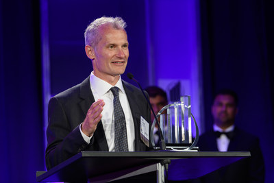 FLEXE Co-Founder and CEO, Karl Siebrecht, accepting the 2019 Entrepreneur Of The Year® Award. Photo credit: Kevin Lisota on behalf of EY.