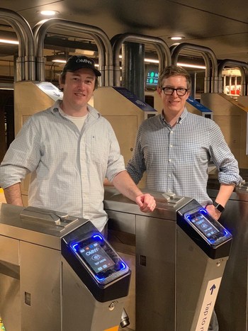 Reflexions Partners Alex Smith and Daniel Leslie with OMNY turnstile readers