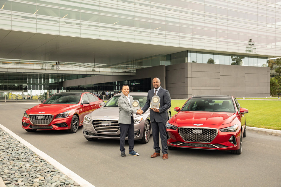 Genesis Motor America COO, Erwin Raphael, accepts #1 Overall Brand and G70 Premium Compact Car segment winner awards from J.D. Power & Associates Vice President, Sales in the Global Automotive Division, Michael Battaglia.