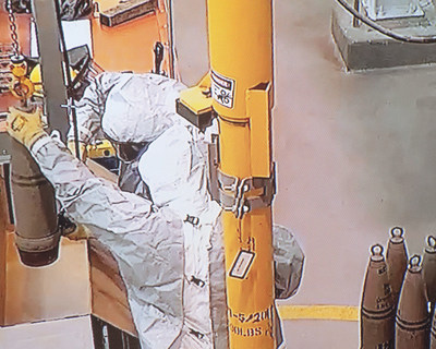 A view from the control room monitor at the Blue Grass Chemical Agent-Destruction Pilot Plant shows the first chemical weapon to be destroyed -- a 155mm artillery shell filled with mustard agent from the World War II era. The plant will destroy 523 tons of mustard and nerve agents over the next four years, eradicating the last of the U.S. chemical weapons stockpile.