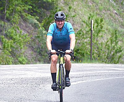 New Flight Charters' own Kelan Poorman rides through the Colorado mountains in the 2019 Race Across America (RAAM).