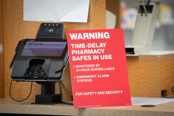 CVS Pharmacy locations now feature signs notifying customers about the chain's time-delay safe technology to help deter pharmacy robberies and diversion of controlled substance narcotic medications. (PRNewsfoto/CVS Pharmacy)