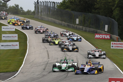 Driving the #27 Andretti Autosport Honda (right), Alexander Rossi sweeps across the front of pole qualifier and fellow Honda driver Colton Herta to take the lead in today’s REV Group Grand Prix at Road America. Rossi went on to dominate today’s NTT IndyCar Series race for his second win of the season, and the fifth for a Honda driver. 