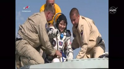 NASA astronaut Anne McClain is assisted out of the Soyuz MS-11 that returned her and crewmates Oleg Kononenko of the Russian space agency Roscosmos and David Saint-Jacques of the Canadian Space Agency back to Earth on June 24, 2019, after 204 days aboard the International Space Station.
Credits: NASA Television
