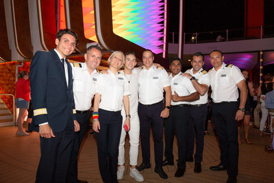 Olympic medalist and Pride Party at Sea Grand Marshal Adam Rippon celebrating Pride Month with Celebrity Cruises and crew members of the new Celebrity Edge in Ibiza, Spain.