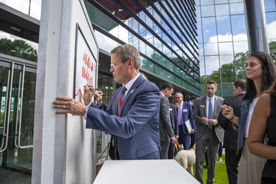 Gov. Bill Lee of Tennessee signs a commemorative plaque highlighting the Mars Petcare purpose – A BETTER WORLD FOR PETS – at the grand opening of their North America Headquarters, which the company has deemed as the most pet-friendly workplace in the state.