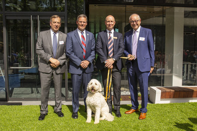 Representative Sam Whitson (Tennessee), Gov. Bill Lee (Tennessee), Mark Johnson, President of Mars Petcare North America and his dog Ollie, as well as Franklin, Tenn., Mayor Ken Moore pose before the grand opening of the new Mars Petcare North America Headquarters, which the company has deemed as the most pet-friendly workplace in the state.