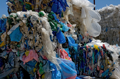 Bales of recyclable film plastic being stored at a material recovery facility. (CNW Group/Recycle More Bags)