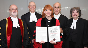 The Hon. Gloria Epstein (middle) received an honorary LLD from the Law Society of Ontario at the June 25 morning Call to the Bar ceremony in Toronto. She was honoured for her dedication and contributions to the legal profession and community at large. Shown here congratulating her are (l-r): LSO Treasurer Malcolm Mercer; The Hon. George R. Strathy, Chief Justice of Ontario; LSO lay bencher Seymour Epstein; and Emeritus Treasurer Janet Minor. (CNW Group/The Law Society of Ontario)