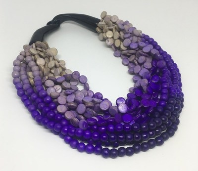 Striking multi-strand necklace by Unijel International Trading Inc