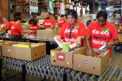Week of Service volunteers from Classic Honda in Orlanda, Fla. helped sort food at a local food pantry.