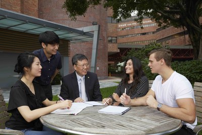 Prof Jin Guang Teng (the middle) believes the role of education is to instill positive values in the next generation and equip them with all-round capabilities to change the world for the better (PRNewsfoto/PolyU)