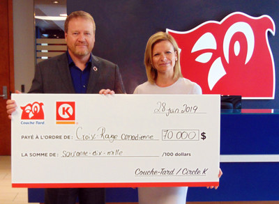 On this picture : Mr. Pascal Mathieu, Vice-president, Quebec, Canadian Red Cross and Sophie Provencher, VP of Operations, Québec West at Couche-Tard. (CNW Group/Alimentation Couche-Tard Inc.)