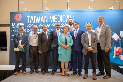 Taiwan Presenters pose for the ceremonial photo after introducing new cost saving medical devices to a crowded room of health professionals and executives looking for advanced technology to cut healthcare costs.