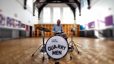 Original Quarry Men drummer Colin Hanton and his drums at St. Peter's Church Hall in Liverpool, the location where John Lennon met Paul McCartney in 1957. (PRNewsfoto/PreFab Four Productions, LLC)