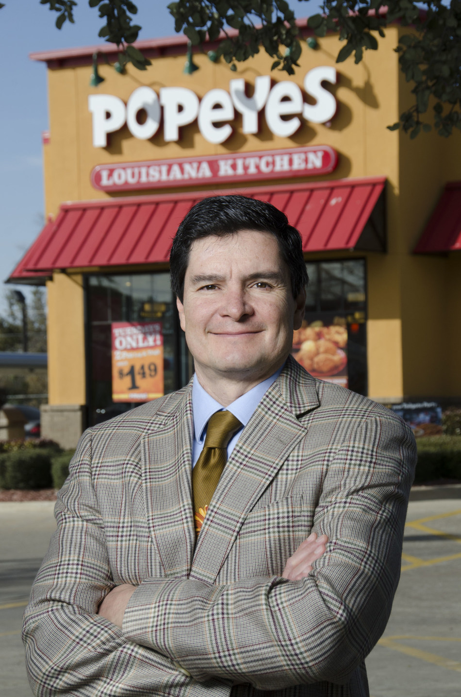 Guillermo Perales, CEO for Sun Holdings, Inc., celebrates the opening of his company's 1,000th store and its 150th Popeyes located in Dallas, Texas.