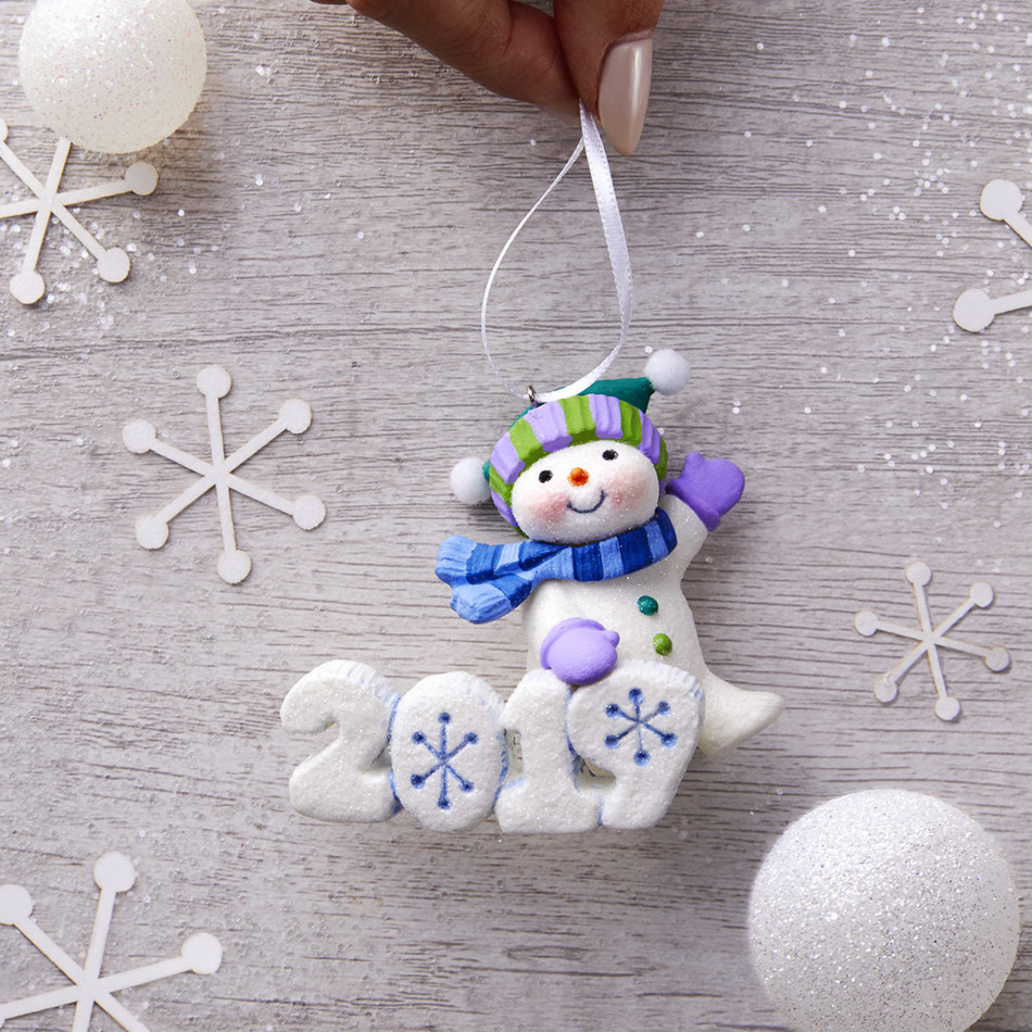 Hallmark Keepsake Ornament collectors remember their year with special ornaments such as the Frosty Fun Decade series.