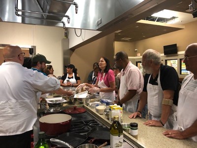 Warriors and their families explored healthy eating and nutrition during a cooking class organized by Wounded Warrior Project® (WWP).
Navy veteran Ramon Luis Maldonado and his wife Claribell joined others in learning how to prepare and grill lamb koftas with rice and salad, while enjoying camaraderie with other warriors and families. Warriors and their families explored healthy eating and nutrition during a cooking class organized by Wounded Warrior Project® (WWP).
Navy veteran Ramon Luis Maldonado and his wife Claribell joined others in learning how to prepare and grill lamb koftas with rice and salad, while enjoying camaraderie with other warriors and families.