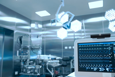 Environment photo of Proximity Systems&rsquo; UV-CLEAN automated UVC light disinfectant device, mounted on top of the medical equipment monitor.