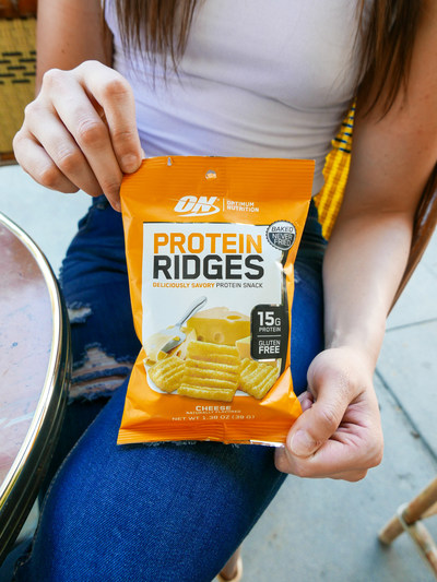 Optimum Nutrition has released its first savory ready-to-eat protein snack. Protein Ridges are baked whey protein squares coated in savory spices in four crave-worthy flavors: BBQ, Sour Cream, Honey Sriracha and Cheese.