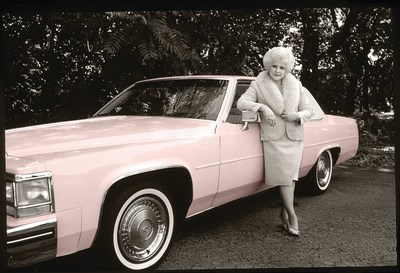Mary Kay Ash with 1985 pink Cadillac.
