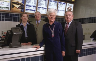 The Culver family stands in one of its restaurants. This week, the restaurant chain celebrated its 35th anniversary.