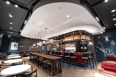 The design is inspired by Tim Horton himself with hockey cues tying back to the brand’s roots found throughout the space. (CNW Group/Tim Hortons)