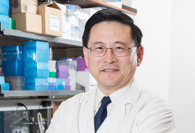 Dr. Ping Wang in his lab Dr. Ping Wang in his lab