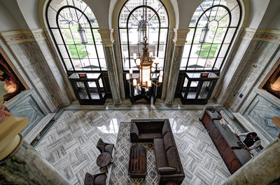 The lobby of the Drury Plaza Cleveland Downtown. The building was originally the Cleveland Board of Education and was renovated into a 189-room hotel. Drury Hotels has been family-owned and operated since 1973.
