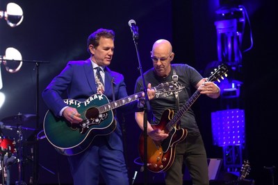 Chris Isaak performs with his custom Gibson J-200.