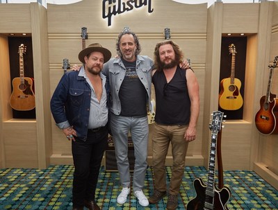 Photo L-R: Nathaniel Rateliff, JC (Gibson CEO), and Jim James announce their partnership and support of the Gibson Foundation.