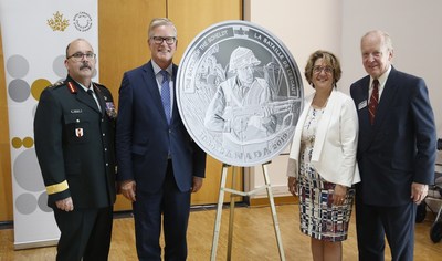 The unveiling of the fine silver coin commemorating the 75th anniversary of the Battle of the Scheldt (Ottawa, July 31, 2019).  From left: Major-General Stephen Whalen, Kingdom of the Netherlands Ambassador Henk van der Zwan, Royal Canadian Mint CEO Marie Lemay and Perley and Rideau Veterans' Health Centre Foundation Chair Keith de Bellefeuille Percy (CNW Group/Royal Canadian Mint)