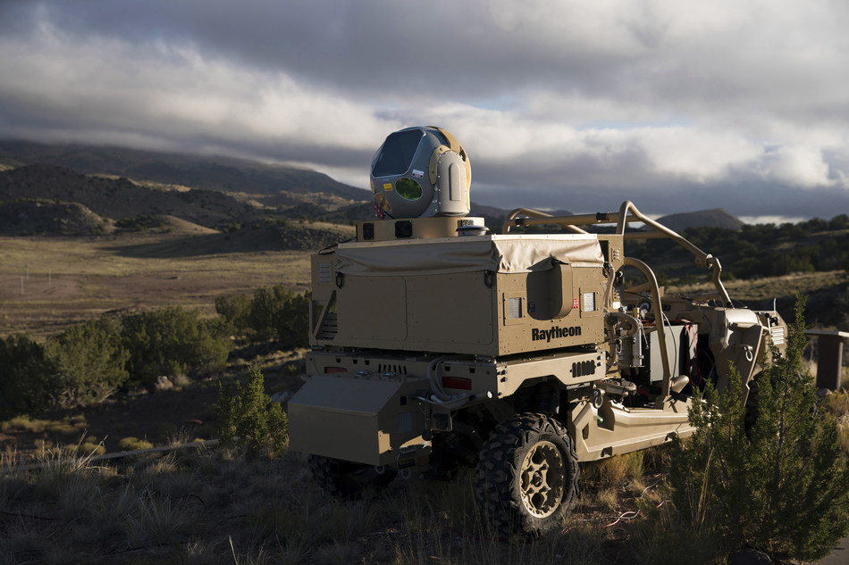 Raytheon's mobile high energy laser looks out into a wide-open sky. The company's advanced high power microwave and high energy laser engaged and defeated dozens of unmanned aerial system targets in a recent U.S. Air Force demonstration. (PRNewsfoto/Raytheon Company)