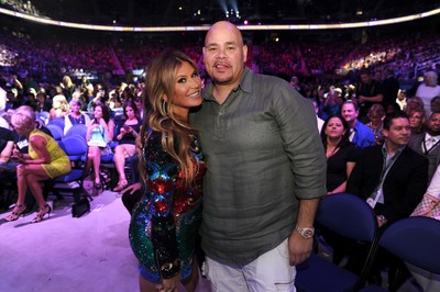 Loren Ridinger and recording artist and Grammy nominee, Fat Joe take a moment for a photo opp as they continue to celebrate the success of the company's Shopping Annuity business model. (PRNewsfoto/Market America | SHOP.COM)