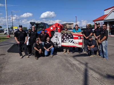 Veterans of Leppo Rents Huddle Around Mission 22 Track Loader