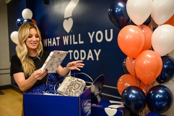 Kaley Cuoco with the first-ever Marshalls Surprise Box, a curated selection of on-trend items across fashion, beauty, home and more.