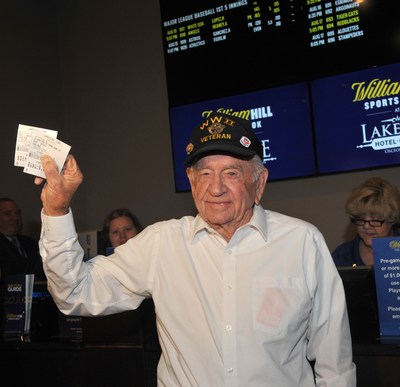 Included in photo: JOSEPH REYNOLDS, Clark County Resident, WWII Veteran who placed the ceremonial first bet