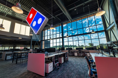 Domino’s is excited to announce the grand opening of its Innovation Garage – a new space where team members will focus on collaborative innovation with cutting-edge technology. The new 33,000-square-foot, two-story building in Ann Arbor features an open-concept design space for 150 Domino’s team members, as well as a fully-functioning pizza theater that project-based teams can use to develop and test new technology in a store setting.