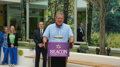 Matt Wesaw, Chairman of the Pokagon Band of Potawatomi Indians, speaks to the media before presenting a check for $127,500 to Beacon Children's Hospital in South Bend, Indiana. For 8 years, the Four Winds Invitational golf tournament has raised funds for Beacon Health System, totaling $672,500.
