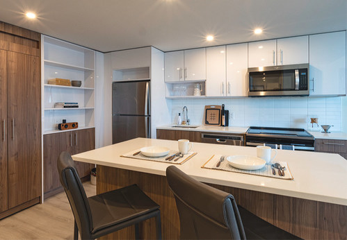 Reimagined open-concept kitchen in a one bedroom model suite at The International (CNW Group/The Minto Group)