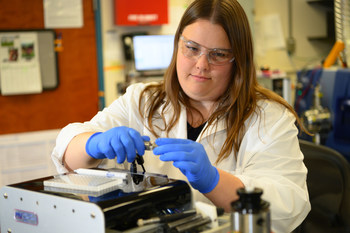 Janna Schultzhaus, postdoctoral research scientist, prepares barnacle glue samples for proteomics analysis using pressure cycling technology at U.S. Naval Research Laboratory, Washington, D.C. August 2, 2019. The use of pressure has enhanced the ability to break down the intractable glue. (U.S. Navy photo by Jonathan Steffen)