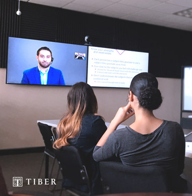 Students attending orientation at St. Thomas University (Miami) while Dr. Ferrahs Abdelbaset, MSMS Coordinator and faculty member, broadcasts from Ponce Health Science University - Saint Louis.