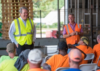 PalletOne CEO Howe Wallace (left) with Bay Wood Products founder Jimmy Wilson (right) announced the acquisition of Bay Wood Products by PalletOne Inc. PalletOne CEO Howe Wallace (left) with Bay Wood Products founder Jimmy Wilson (right) announced the acquisition of Bay Wood Products by PalletOne Inc.